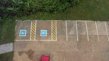 Aerial view of handicapped parking spaces in tourist destinations in Thailand. Parking with a special place for the disabled. photo