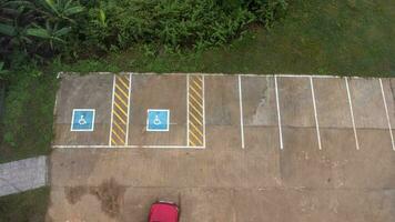 Aerial view of handicapped parking spaces in tourist destinations in Thailand. Parking with a special place for the disabled. photo