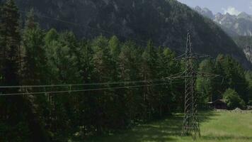a mountain range with a power line and trees video