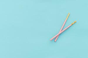 Pocky biscuits isolated on blue background. After some edits. photo