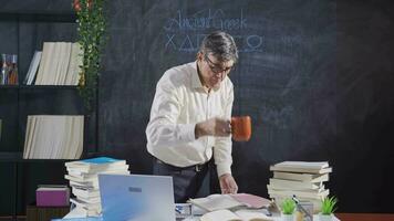 Historian man drawing ancient greek alphabet on blackboard. video