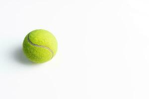 A tennis ball isolated on white background, after some edits. photo