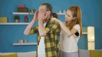 Father and daughter are suffering from headache. video