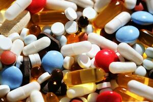 Abstract background with many pills and vitamins. photo