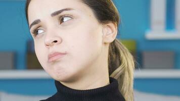 Portrait of unhappy and overwhelmed young woman. video