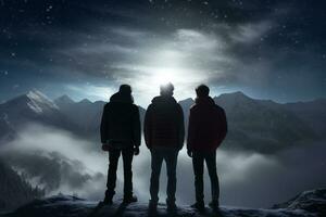 Happy family traveling on snowy mountain peak in winter photo