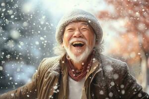 A old woman in winter clothes plays in the snow in front of house photo