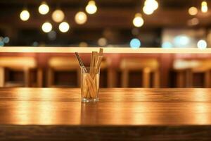 wooden table in front of a blurred background of restaurant lights. AI Generative Pro Photo