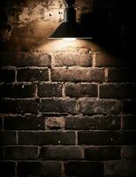 ai generative A single flood light partially lights up a red brick wall and a shaded dark photo