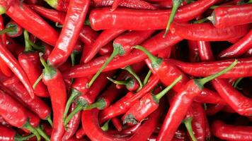 Red Chillies in a basket at the market. video