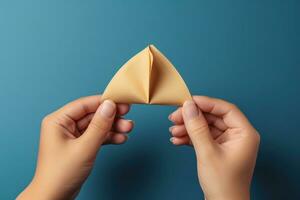 Fortune cookies in hands. Lucky biscuit with blank paper for message inside AI Generative photo