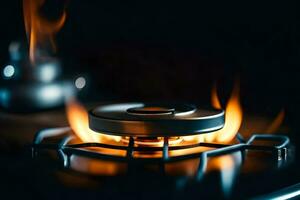 a gas stove with flames on it. AI-Generated photo