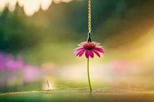 a pink flower hanging from a rope. AI-Generated photo