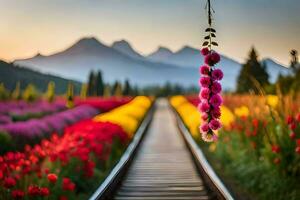 a train track with flowers and mountains in the background. AI-Generated photo