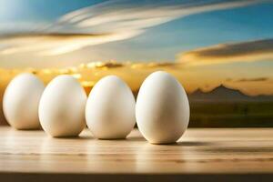 five white eggs on a table with a sunset in the background. AI-Generated photo