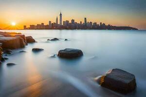 el ciudad horizonte a puesta de sol con rocas en el agua. generado por ai foto