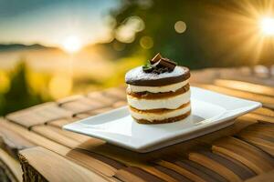 un postre en un plato con un puesta de sol en el antecedentes. generado por ai foto