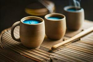 Tres tazas de azul té con un de madera cuchara. generado por ai foto