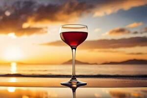 a glass of red wine on the beach at sunset. AI-Generated photo