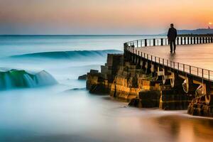 un hombre soportes en un muelle mirando a el Oceano a puesta de sol. generado por ai foto