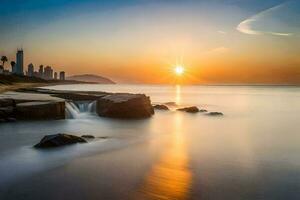 the sun rises over the ocean and rocks in front of a city. AI-Generated photo