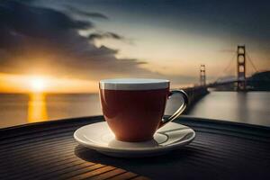 a cup of coffee sits on a table overlooking the golden gate bridge. AI-Generated photo