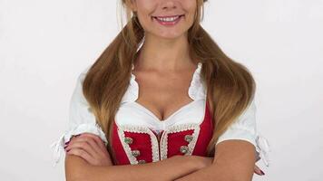 Oktoberfest woman in dirndl dress smiling happily video