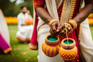 un hombre en tradicional indio atuendo participación dos ollas. generado por ai foto