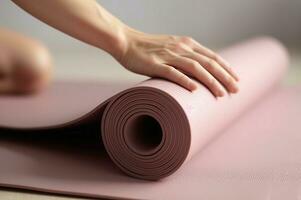 Woman hands rolling yoga mat on floor. Generate Ai photo