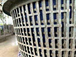 old basket with blue plastic grid photo