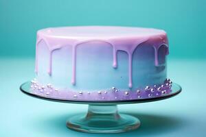 Fluid gel decorating a minimalist cake isolated on a teal gradient background photo