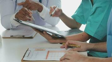 Group of doctors talking to pharmaceutical sales representative. video