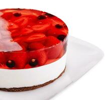 Fresh strawberry with currant jelly cake on plate photo