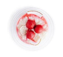 sweet dessert coconut pudding with cherries photo