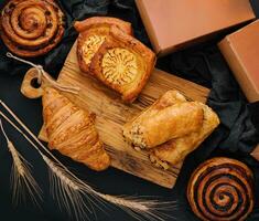 different pastries with boxes for delivery photo