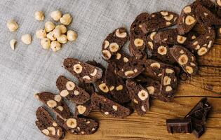 Homemade chocolate cookies with coconut on board photo