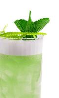 Summer foam cocktail decorated with mint photo