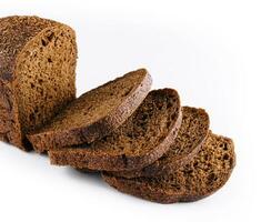 Cut loaf of rye bread isolated on white photo