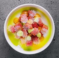 Tartar of tuna with lime snow on top view photo