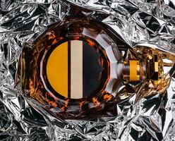 bottle of cognac in foil top view photo
