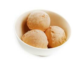 Plain vanilla ice cream scoops without toppings photo