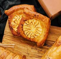 pastries with boxes for delivery on top view photo