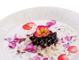 Milk soup with rice cereal in a bowl photo