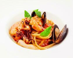 Pescatore tomato sauce pasta with seafood photo