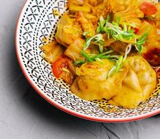 Close-up of chinese dumplings on plate photo