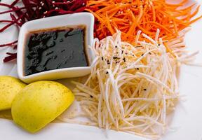 Grated Carrot, Beetroot and Celery Root Salad photo