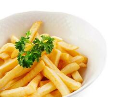 Tasty Fried Potato French Fries on White Plate photo