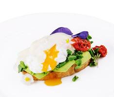 toast with avocado and poached egg photo