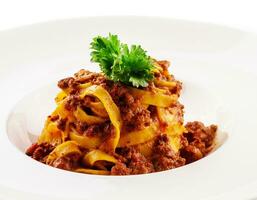 Spaghetti bolognese with minced beef on plate photo