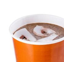 Cream of mushroom soup in cup isolated photo